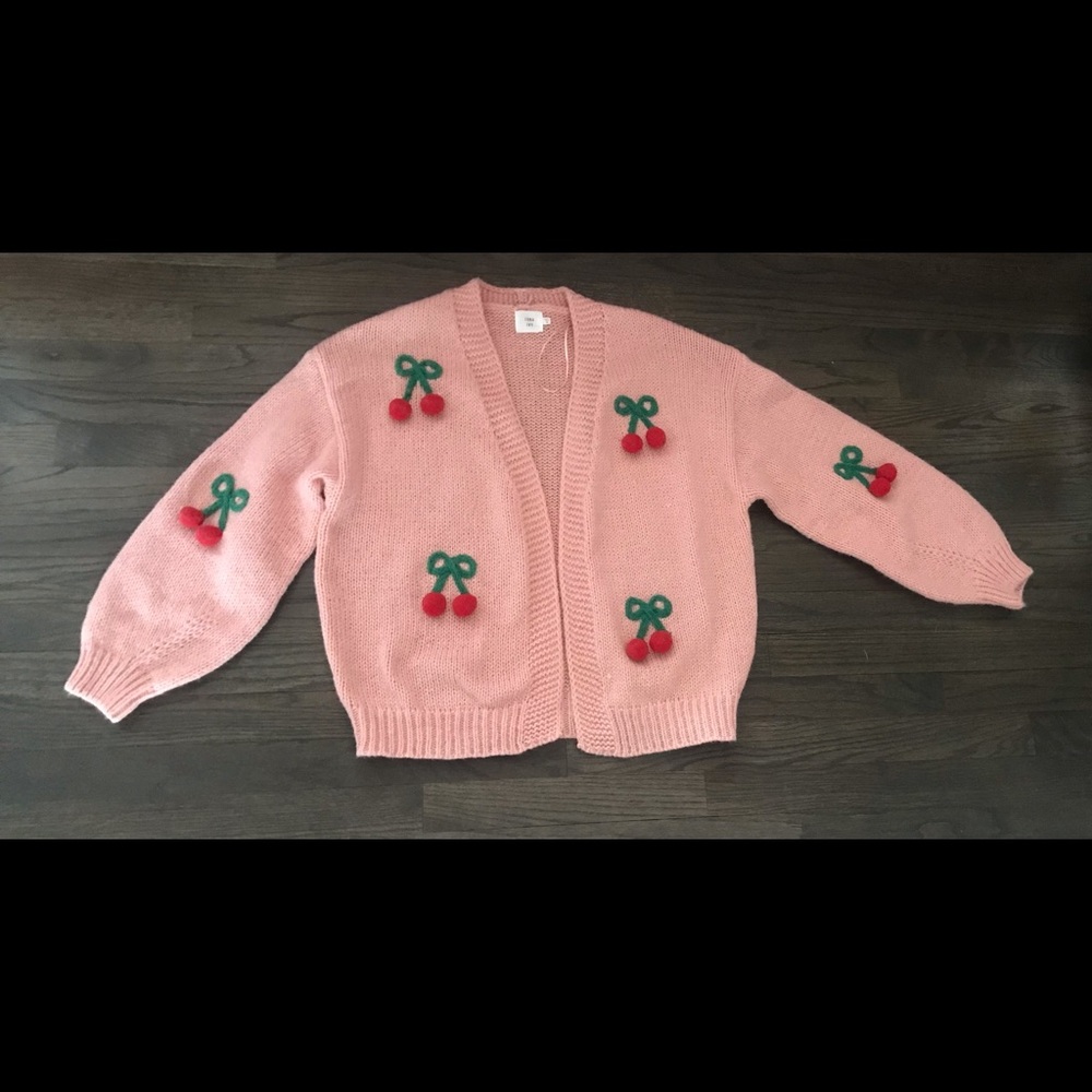 Pink sweater cardigan with cherries embellishment